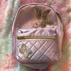 Girls Mini Backpack, purple with butterfly and rainbow detail. Great condition
